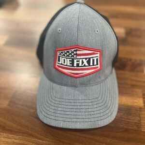 Joe Fix It ball cap in used condition